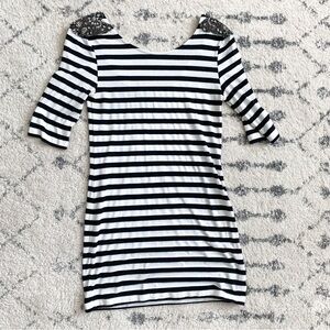 Bebe Black and white top with shoulder details